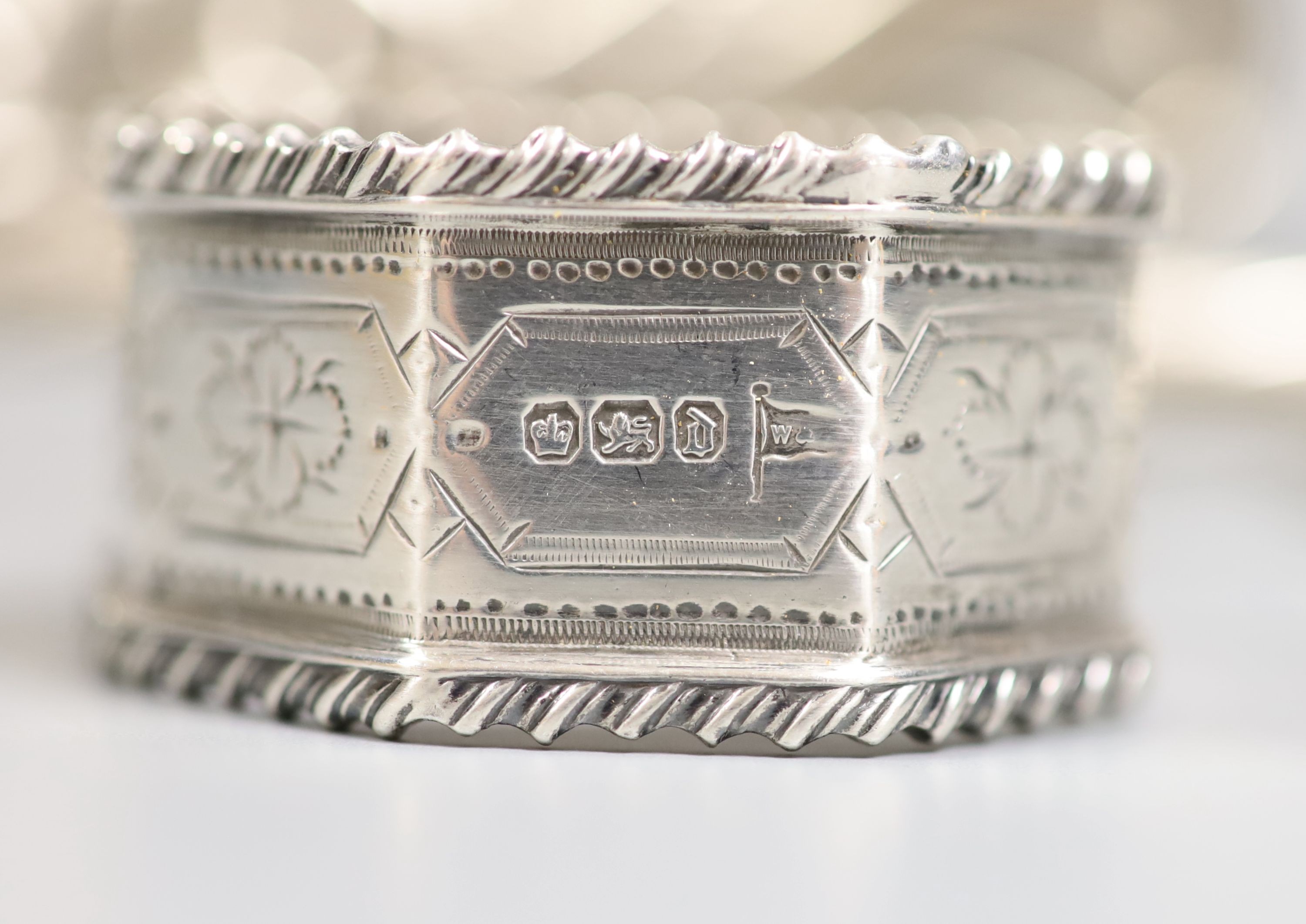 Four George V silver kiddush cups, largest 10.9cm, two other Judaic items, a 925 letter rack, silver napkin ring and Edwardian silver sugar basket.